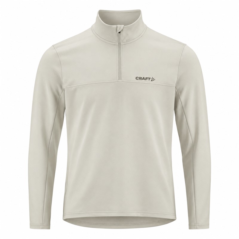 Originalni moški funkcionalni midlayer CRAFT Core Gain Midlayer M Cloud v svetlo sivi barvi. Izdelan iz 88 % recikliranega poliestra in 12 % elastana. Mehka funkcionalna jersey tkanina z rahlo brušeno notranjostjo zagotavlja prijetno toplotno udobje, polovična zadrga omogoča prilagajanje zračenja, oprijet kroj Tight Fit pa udobno prileganje. Primeren za tek, pohodništvo, smučanje, treninge in vsakodnevno športno uporabo.