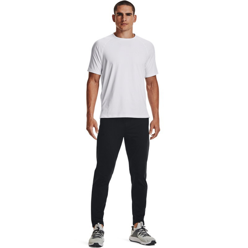 The Under Armour Meridian Tapered Pants 1373730-001 men's tracksuit is designed for comfort and practicality during workouts or everyday activities. Made from soft and stretchy material, the tracksuit provides freedom of movement and a comfortable fit.