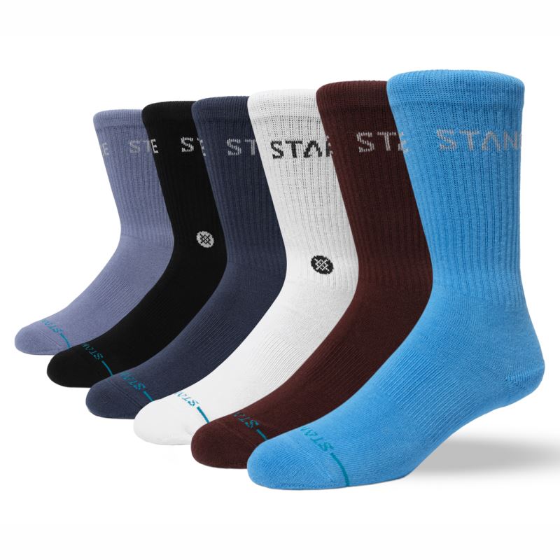 Set šestih parov Stance Origin crew nogavic v različnih osnovnih barvah, srednje debeline (medium cushioning) in klasične crew višine, primernih za vsakodnevno nošenje in šport.