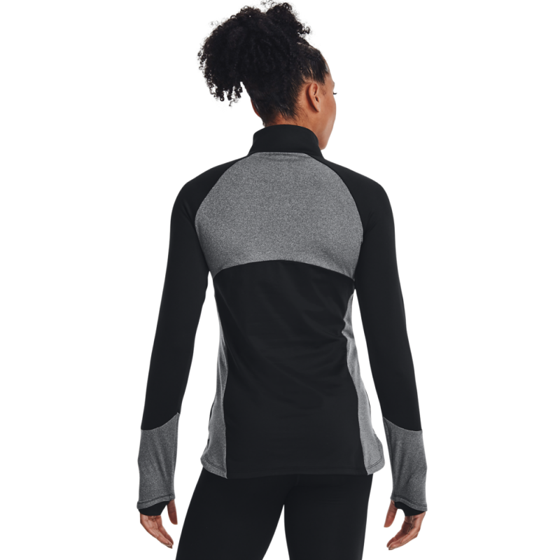 Ženska športna majica UA ColdGear 1/2 ZIP, pod blagovno znamko Under Armour, je zasnovana tako, da zagotavlja udobje, toploto in funkcionalnost med športnimi aktivnostmi v hladnejših pogojih