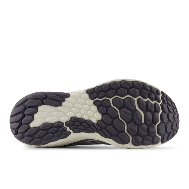 Ženske tekaške superge New Balance Evoz V4 z odzivno vmesno podlogo, lahkotno in zračno zgornjico ter udobnim podplatom za stabilen in energičen tek.