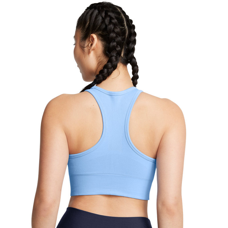 The Under Armour Vanish Seamless Mid Bra women's bra offers exceptional comfort and support during sports activities. Its seamless design ensures a smooth fit, while the material effectively wicks away sweat, keeping you dry and comfortable during workouts.