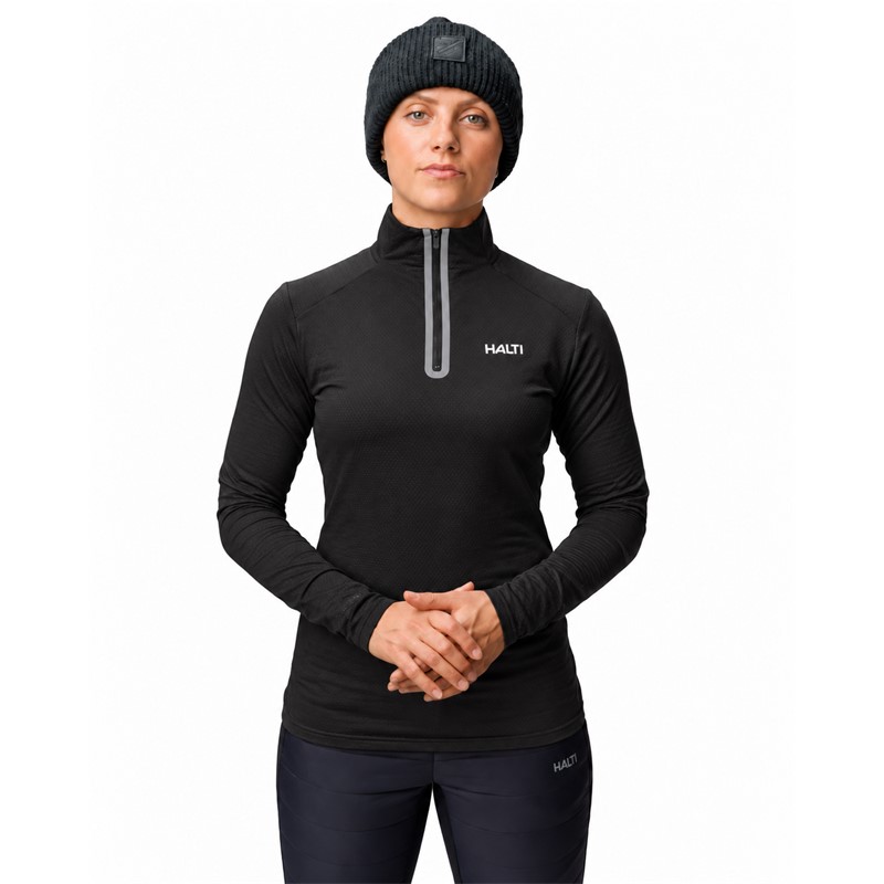 Women's technical ski pullover HALTI JAAKO BLACK in elegant black color. Light Active Dry Sport Knit material 94% recycled polyester and 6% elastane, mesh-structured interior and high collar ensure effective moisture wicking, breathability and freedom of movement for skiing, hiking and other activities.