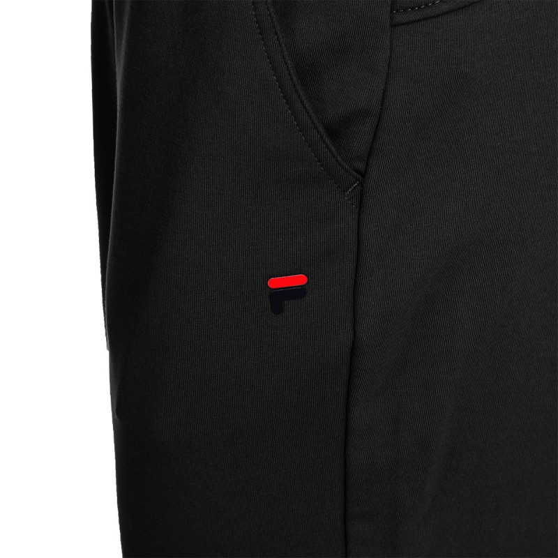 Women's long pants FILA IDA have a wide elastic waistband with a drawstring, two side pockets, and a smaller logo on the left side. They are very comfortable and fit the body perfectly. They are characterized by comfortable material and quality workmanship.
