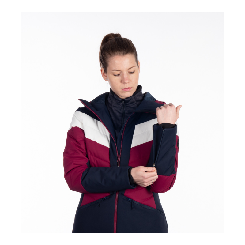 Ženska smučarska jakna NORTHFINDER IDA združuje moderen dizajn, 10K/10K vodoodporno zaščito in toplo sintetično izolacijo. Snežni pas, fiksna 3D kapuca in PFC-free obdelava za popolno udobje na smučišču.