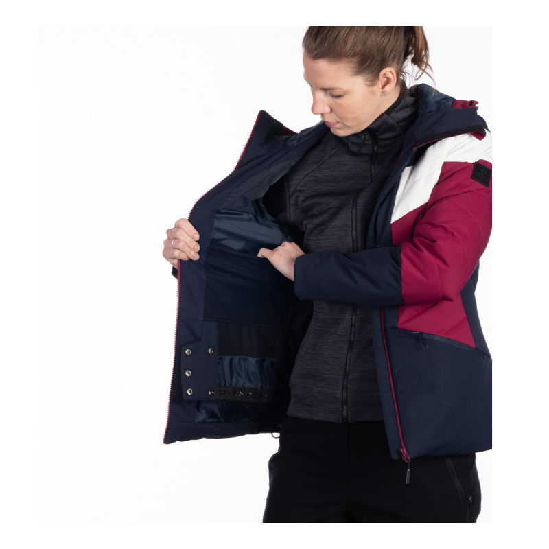 Ženska smučarska jakna NORTHFINDER IDA združuje moderen dizajn, 10K/10K vodoodporno zaščito in toplo sintetično izolacijo. Snežni pas, fiksna 3D kapuca in PFC-free obdelava za popolno udobje na smučišču.