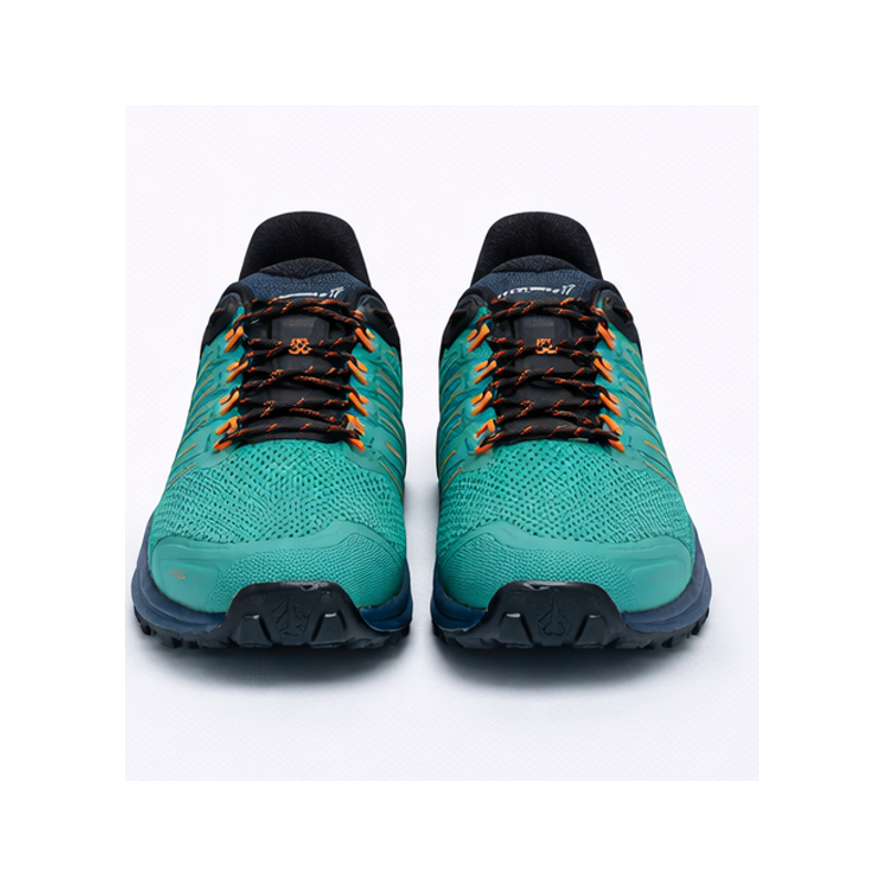 Ženske trail superge INOV8 ROCLITE G 275 z Graphene Grip podplatom in Powerflow blaženjem. Lahke, udobne in idealne za tek po suhem, mokrem ali skalnatem terenu.