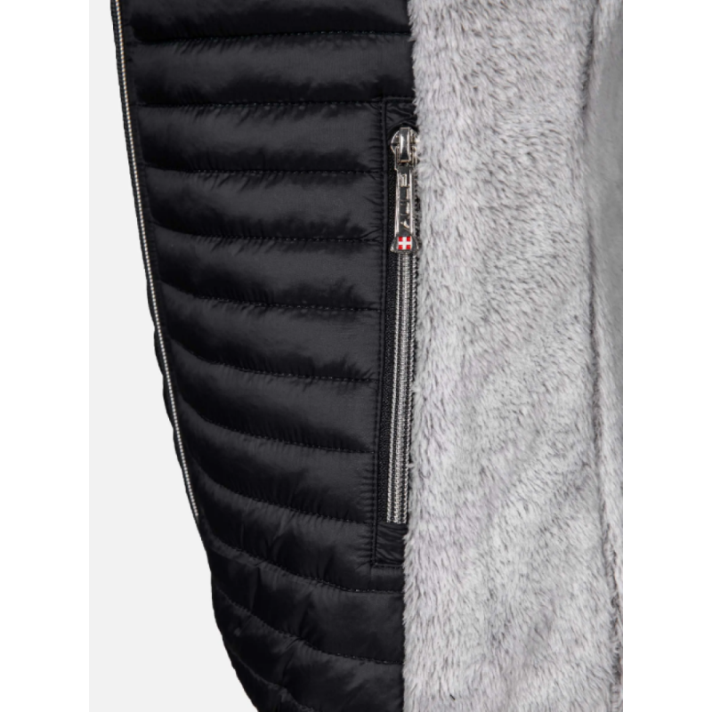 Ženski brezrokavnik AULP UNIMA FEMME GILET POLAIRE iz umetnega krzna je popoln za dneve, ko iščete udobje, ne da bi žrtvovali kanček topline.Ženski brezrokavnik AULP UNIMA FEMME GILET POLAIRE  lahko priročno oblečete čez majico ali srajco. 