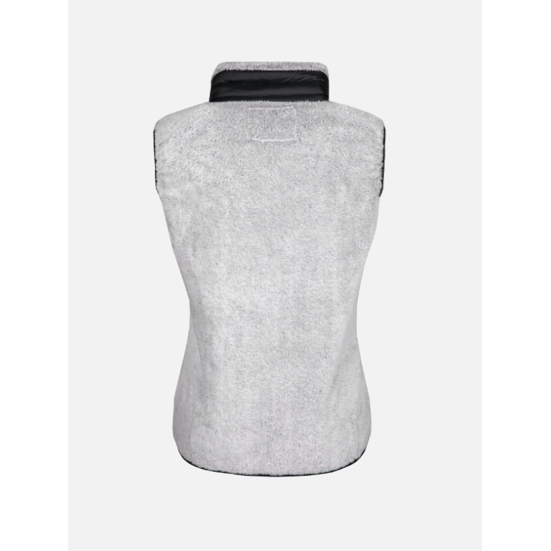 Ženski smučarski brezrokavnik AULP UNIMA iz mehkega umetnega krzna nudi ravno prav topline in popolno svobodo gibanja. Idealen za plastno oblačenje v gorah ali mestu. Slim fit kroj za eleganten videz.