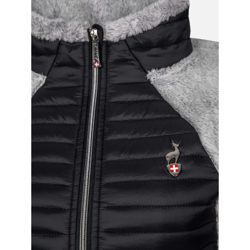 Ženski smučarski brezrokavnik AULP UNIMA iz mehkega umetnega krzna nudi ravno prav topline in popolno svobodo gibanja. Idealen za plastno oblačenje v gorah ali mestu. Slim fit kroj za eleganten videz.