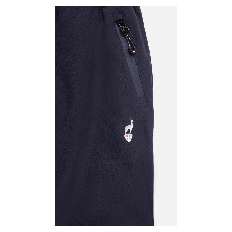 The children's ski pants AULP SAVIO with a waterproof membrane 10K/10K, removable suspenders, and snow gaiters provide warmth and protection in the snow.