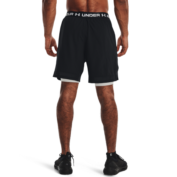 Moške športne kratke hlače Under Armour Vanish Woven 2-in-1 STS 1373764-686 so zasnovane za dinamične moške, ki iščejo udobje in praktičnost med športnimi aktivnostmi. Te hlače združujejo zunanje hlače in notranje kompresijske hlače