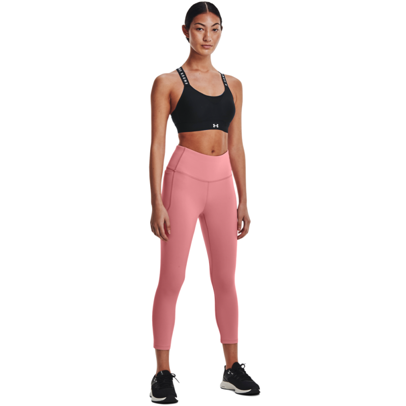 Ženske pajkice UNDER ARMOUR MERIDIAN CROP 1355915-663 - zasnovane z inovativno tkanino, ki nudi edinstveno mehkobo in učinkovito odvaja znoj. Lahek in zračen material zagotavlja udobje pri gibanju, kar jih naredi popolne za treninge in aktivne dni. 