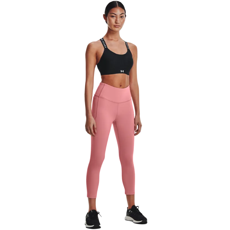 Ženske pajkice UNDER ARMOUR MERIDIAN CROP 1355915-663 - zasnovane z inovativno tkanino, ki nudi edinstveno mehkobo in učinkovito odvaja znoj. Lahek in zračen material zagotavlja udobje pri gibanju, kar jih naredi popolne za treninge in aktivne dni.